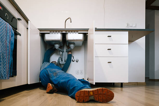 Professional Plumbing technician working in Utica, IN